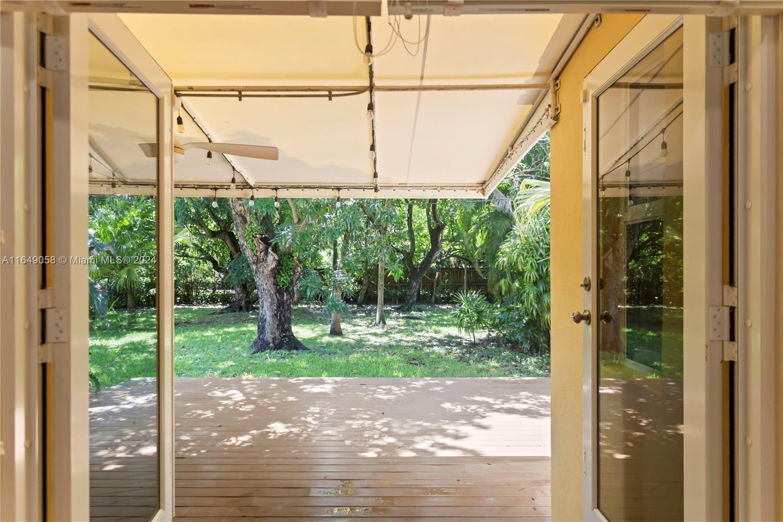 610 Southwest 25th Road Miami, FL 33129 - Photo 17 of 46 a view of a yard with street from window