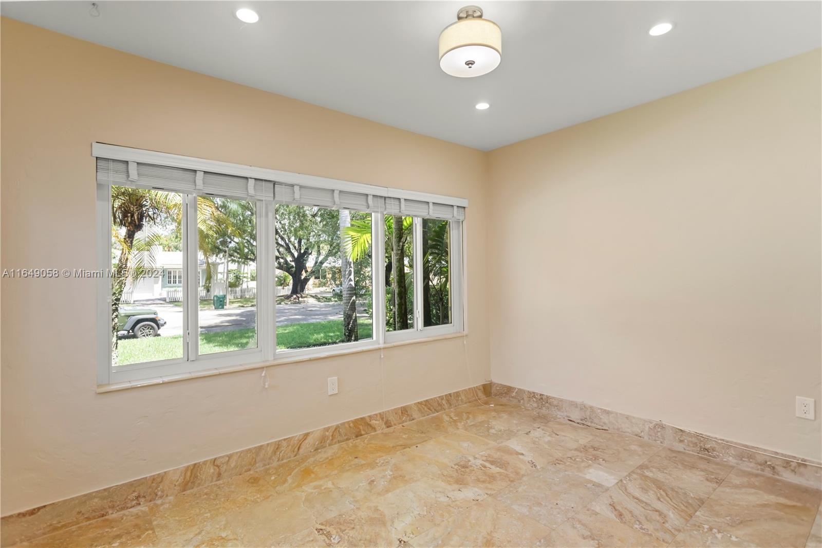 610 Southwest 25th Road Miami, FL 33129 - Photo 18 of 46 an empty room with a window