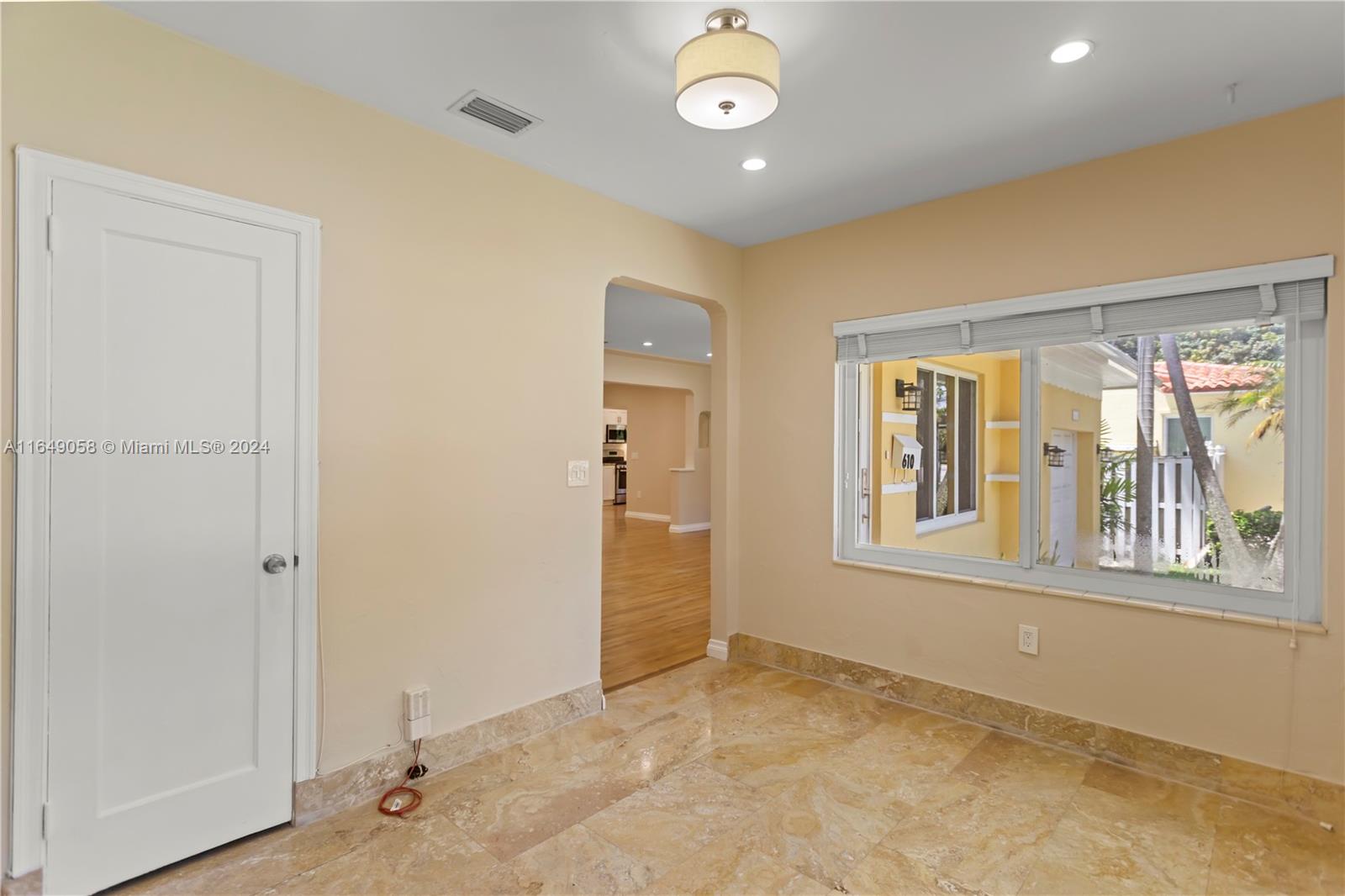 610 Southwest 25th Road Miami, FL 33129 - Photo 20 of 46 a view of an empty room with a window