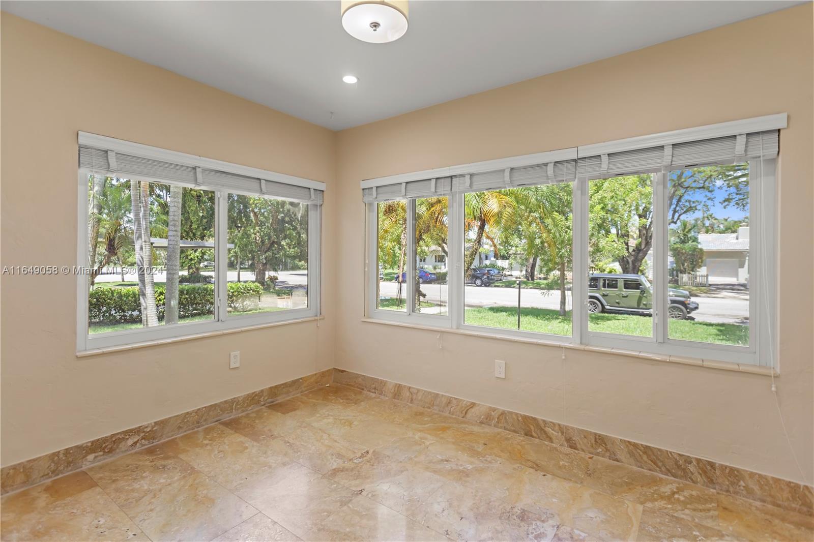 610 Southwest 25th Road Miami, FL 33129 - Photo 21 of 46 a view of an empty room with a window