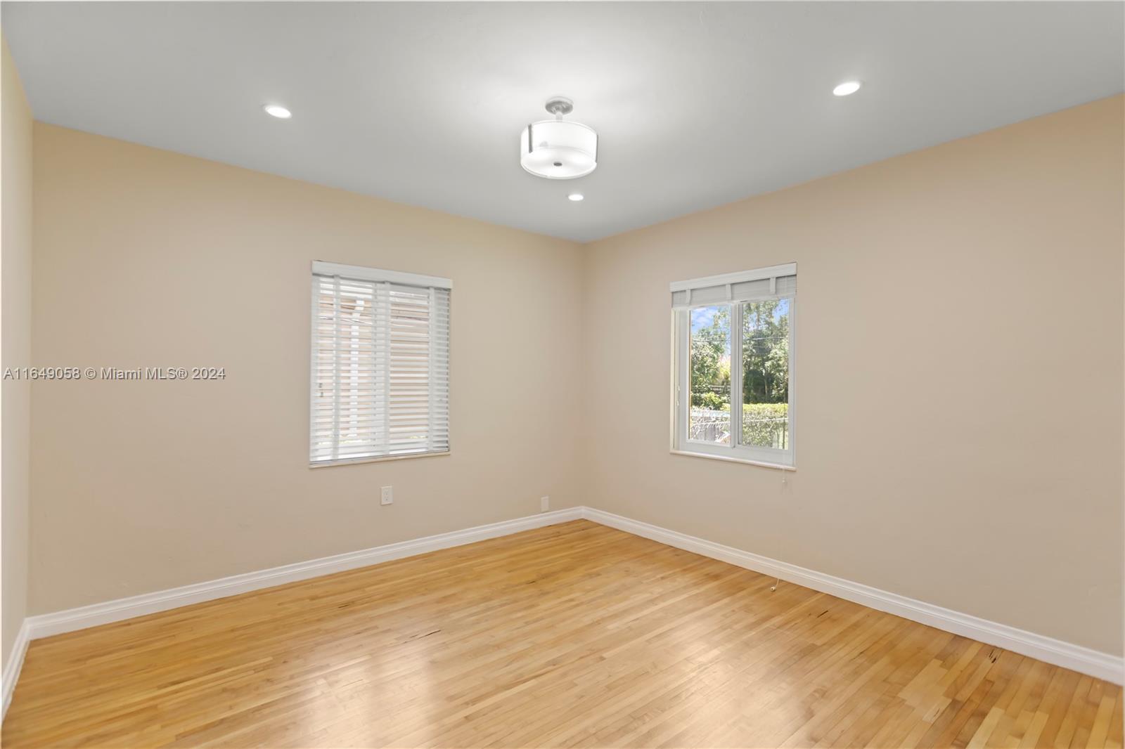 610 Southwest 25th Road Miami, FL 33129 - Photo 28 of 46 a view of an empty room with a window
