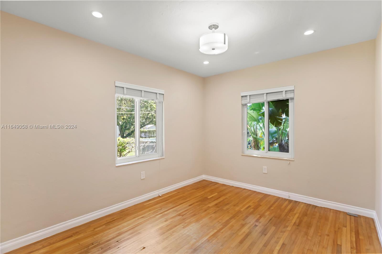 610 Southwest 25th Road Miami, FL 33129 - Photo 37 of 46 an empty room with a window