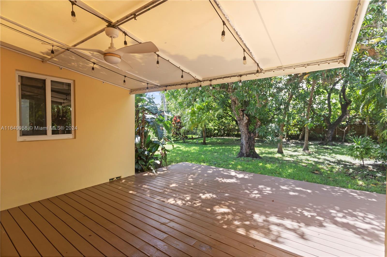 610 Southwest 25th Road Miami, FL 33129 - Photo 42 of 46 a view of a backyard with plants and large trees