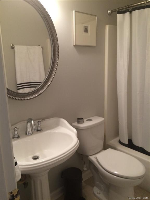 1037 Ridgefield Circle Indian Trail, NC 28079 - Photo 11 of 19 a bathroom with a toilet and a mirror