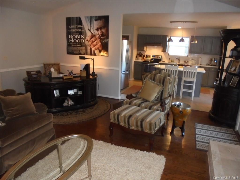 1037 Ridgefield Circle Indian Trail, NC 28079 - Photo 19 of 19 a living room with furniture and wooden floor