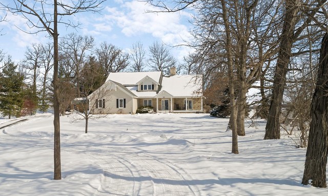8N261 Thomas Road Maple Park, IL 60151 - Photo 1 of 36 a view of a house with a yard covered in snow