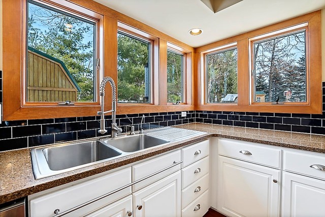 8N261 Thomas Road Maple Park, IL 60151 - Photo 12 of 36 a kitchen with granite countertop a sink and a window