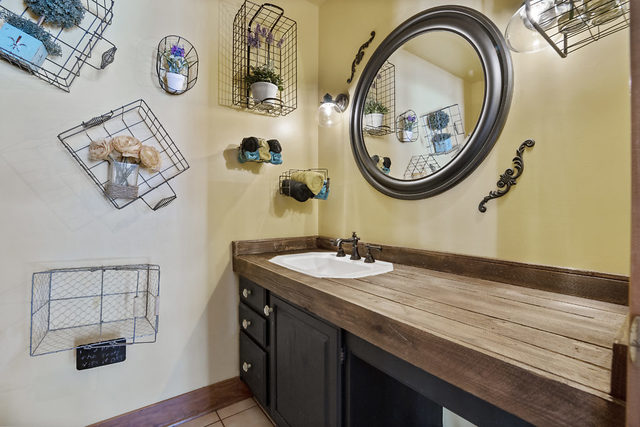 8N261 Thomas Road Maple Park, IL 60151 - Photo 13 of 36 a bathroom with a granite countertop double vanity sink and a mirror