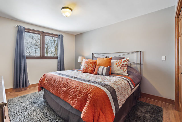 8N261 Thomas Road Maple Park, IL 60151 - Photo 20 of 36 a bedroom with a bed and window