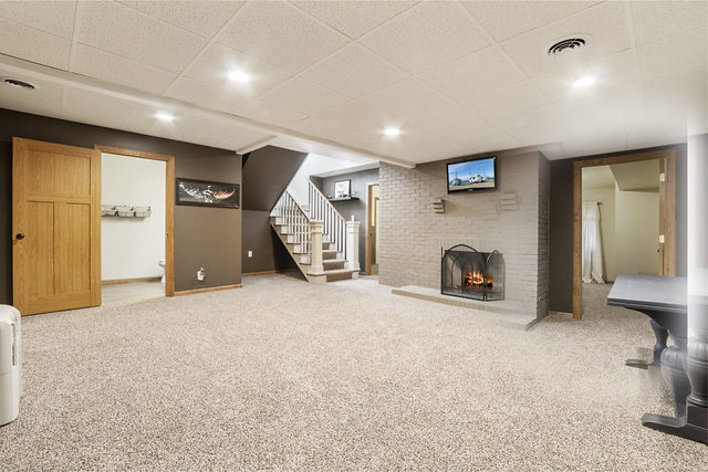 8N261 Thomas Road Maple Park, IL 60151 - Photo 25 of 36 an empty room with furniture and a fireplace