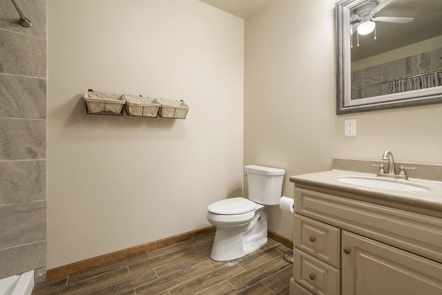 8N261 Thomas Road Maple Park, IL 60151 - Photo 27 of 36 a bathroom with a toilet and a sink