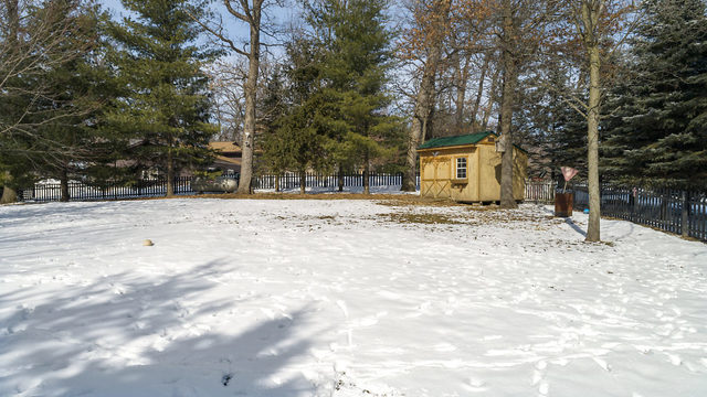 8N261 Thomas Road Maple Park, IL 60151 - Photo 29 of 36 a house with trees in the background