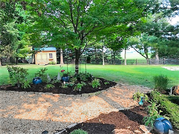 8N261 Thomas Road Maple Park, IL 60151 - Photo 31 of 36 a view of a garden with large trees