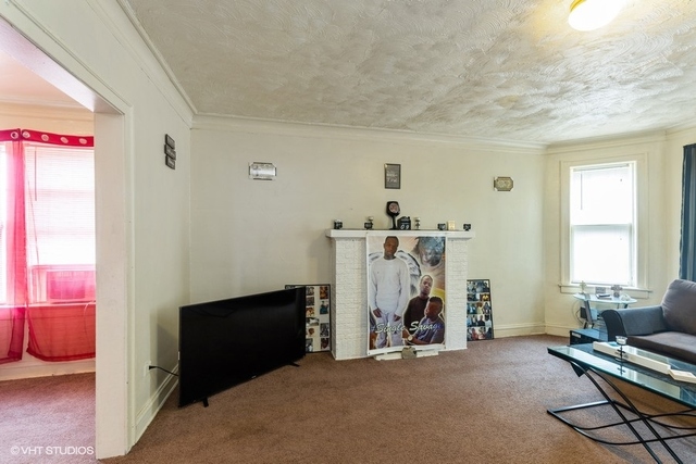 Undisclosed Address Chicago, IL 60619 - Photo 3 of 12 a view of livingroom with furniture and windows