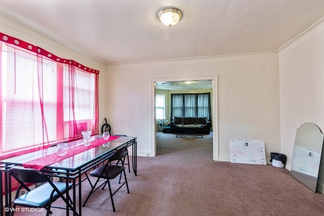 Undisclosed Address Chicago, IL 60619 - Photo 4 of 12 a view of a room with furniture and window