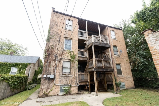 Undisclosed Address Chicago, IL 60619 - Photo 8 of 12 a front view of a building