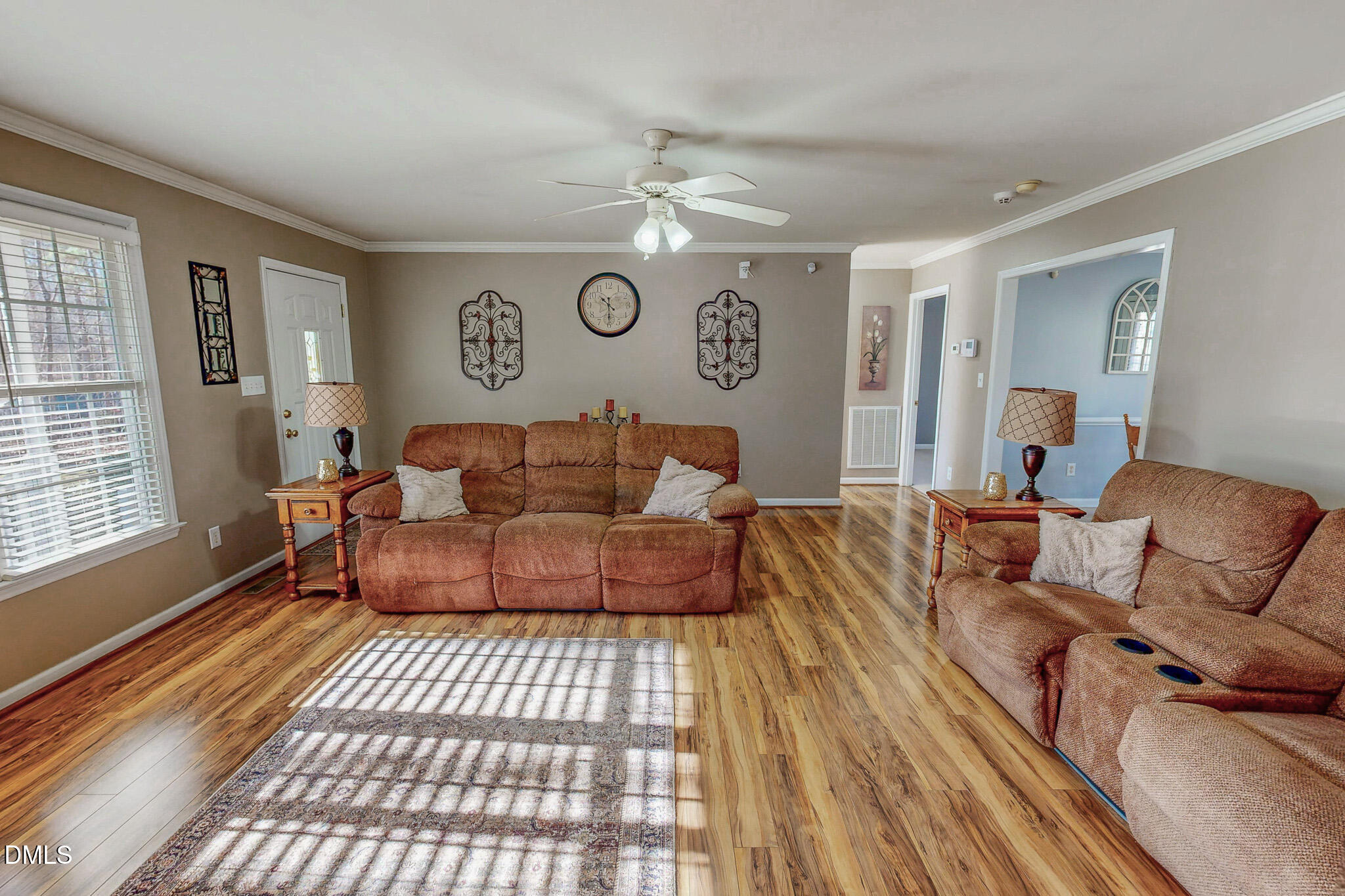 60 Forest Drive Timberlake, NC 27583 - Photo 15 of 40 a living room with furniture and a window