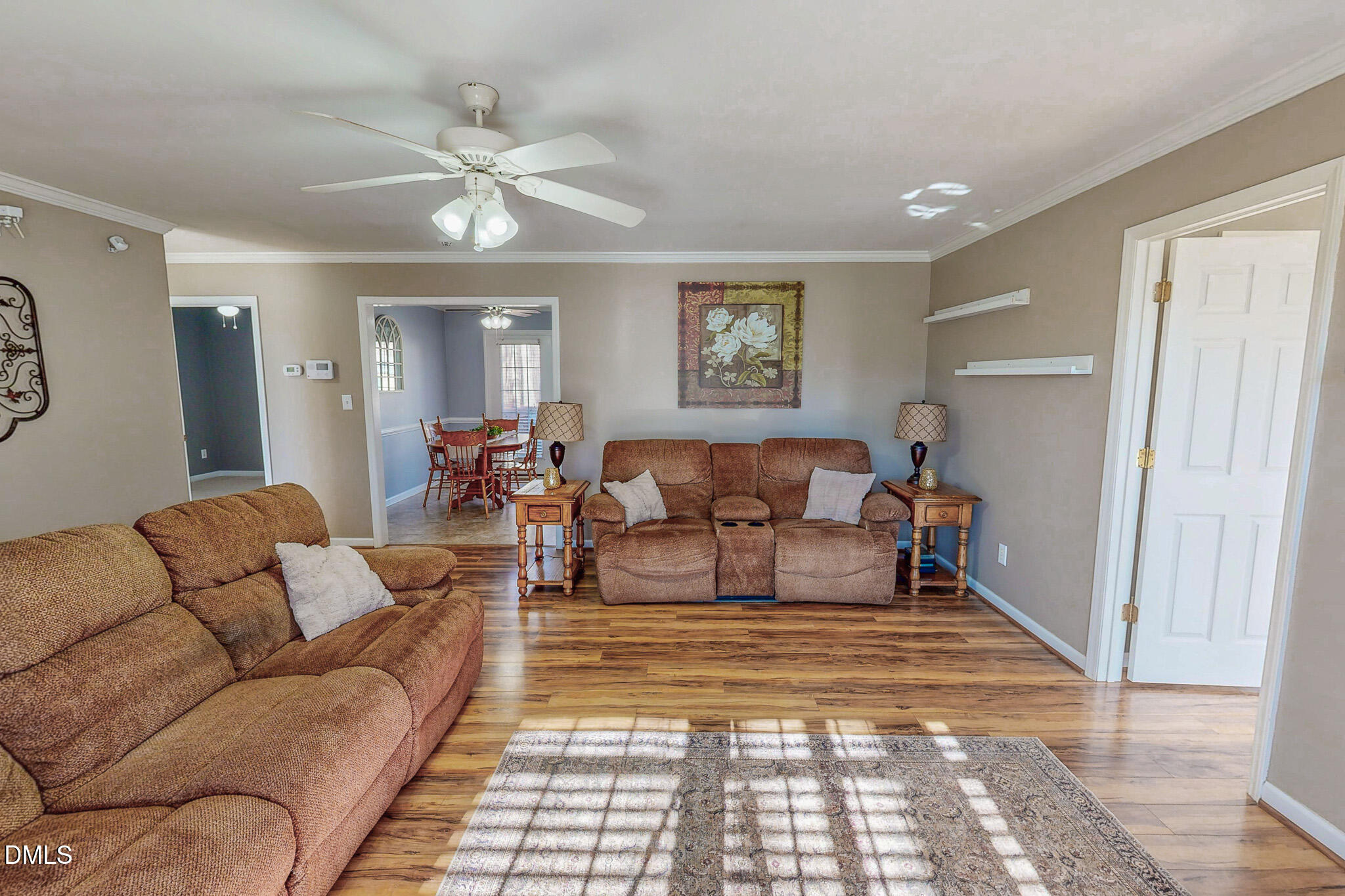 60 Forest Drive Timberlake, NC 27583 - Photo 16 of 40 a living room with furniture and a rug