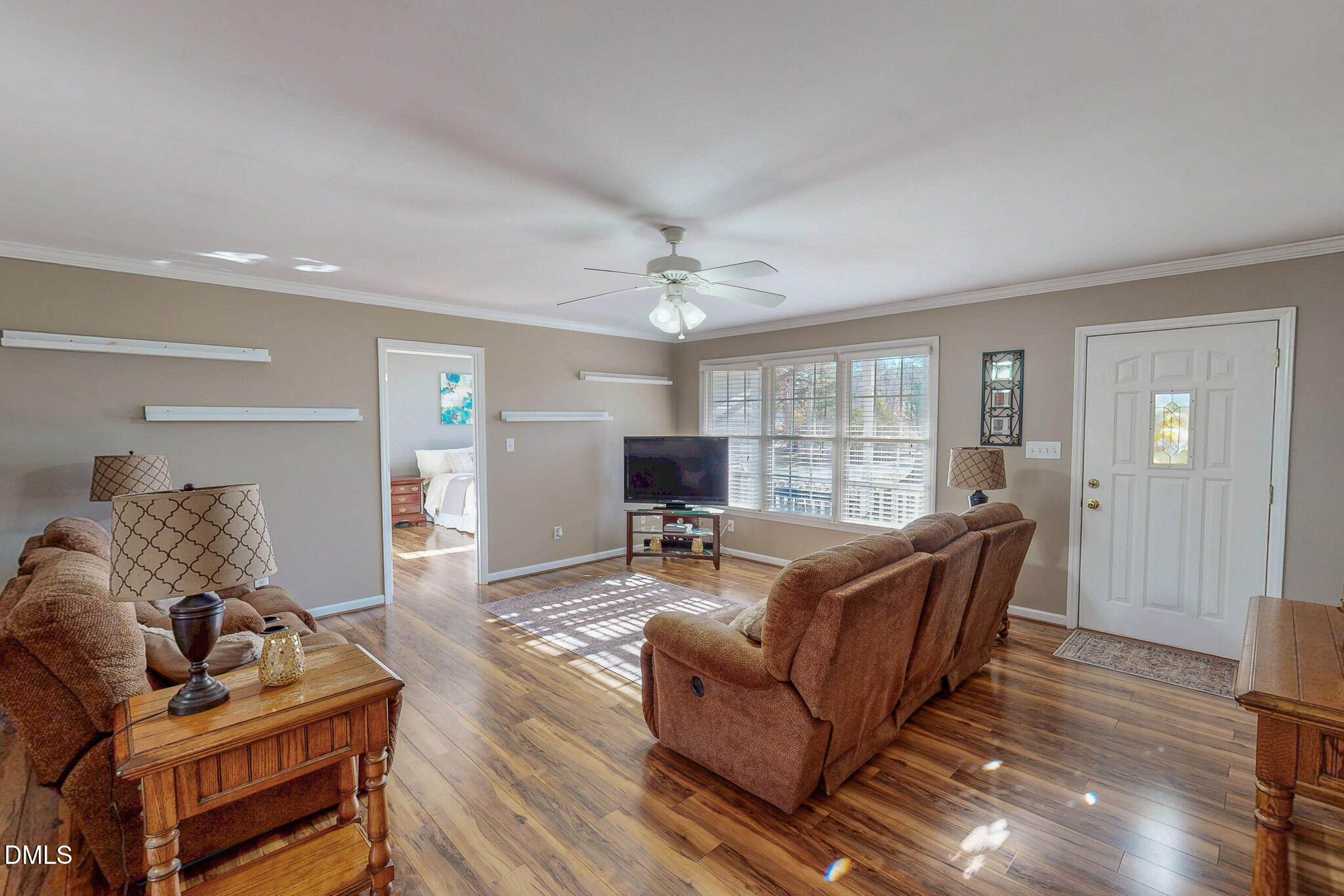 60 Forest Drive Timberlake, NC 27583 - Photo 2 of 40 a living room with furniture and a large window