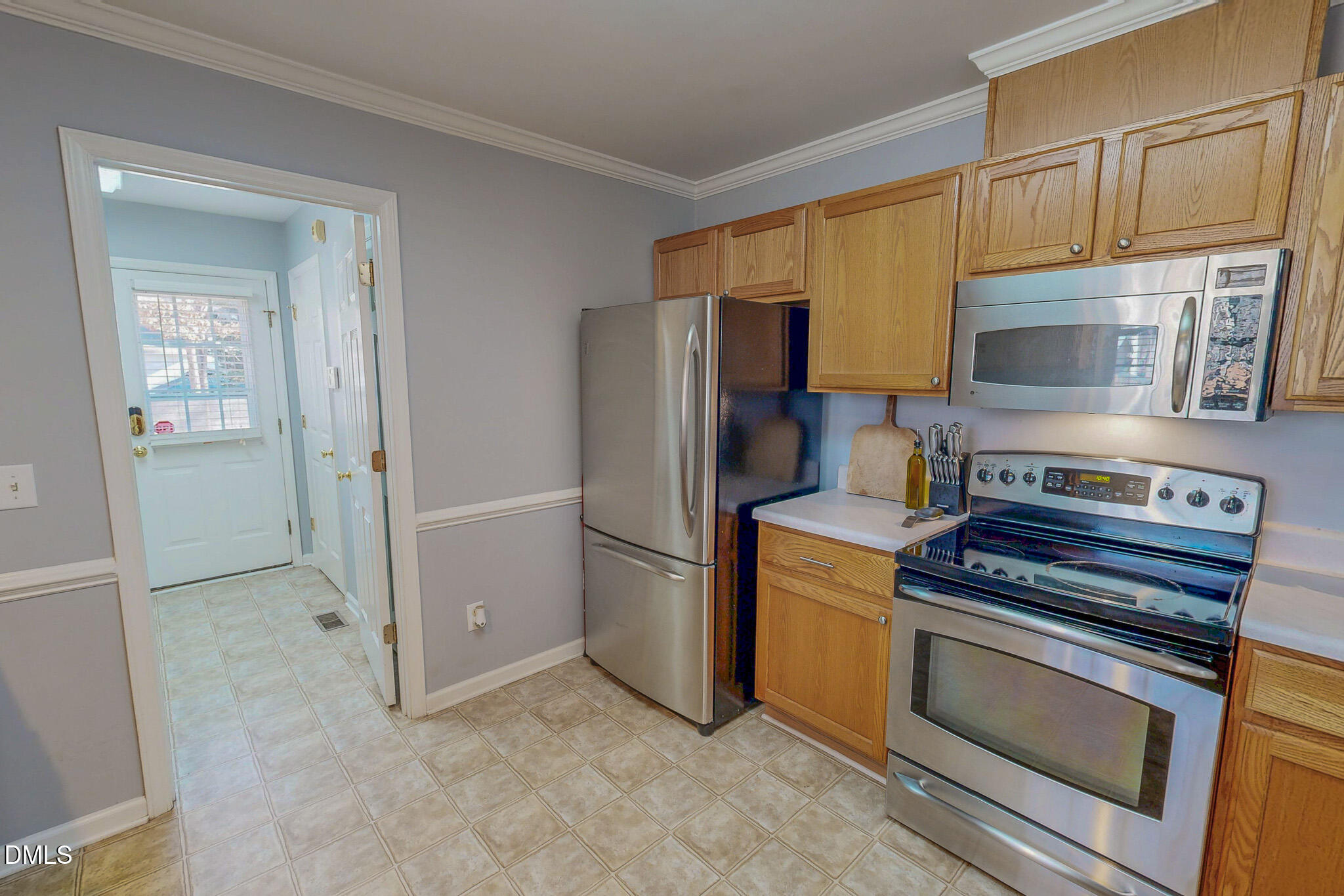 60 Forest Drive Timberlake, NC 27583 - Photo 26 of 40 a kitchen with a stove and a microwave