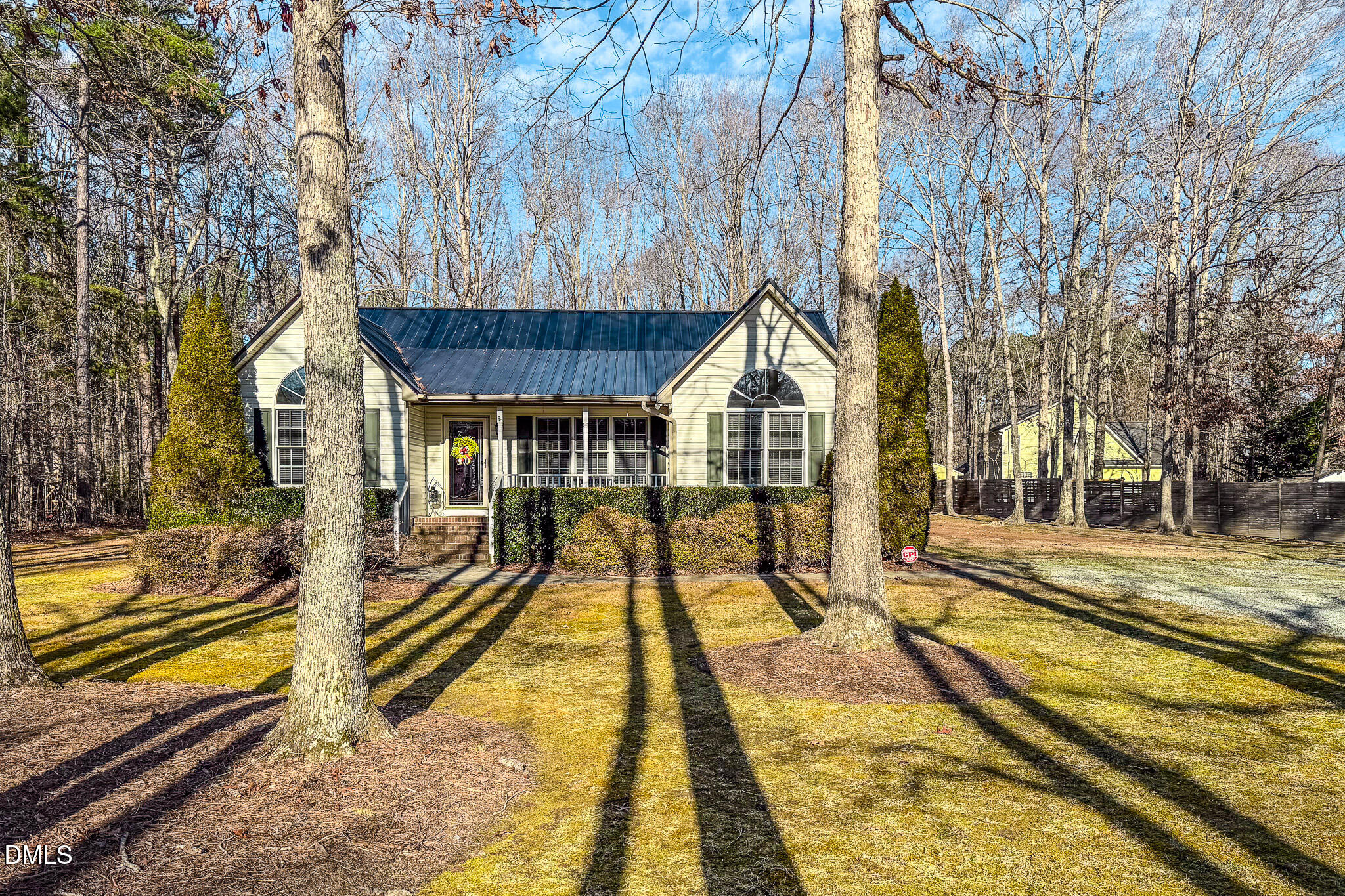 60 Forest Drive Timberlake, NC 27583 - Photo 30 of 40 a view of a house with a swimming pool