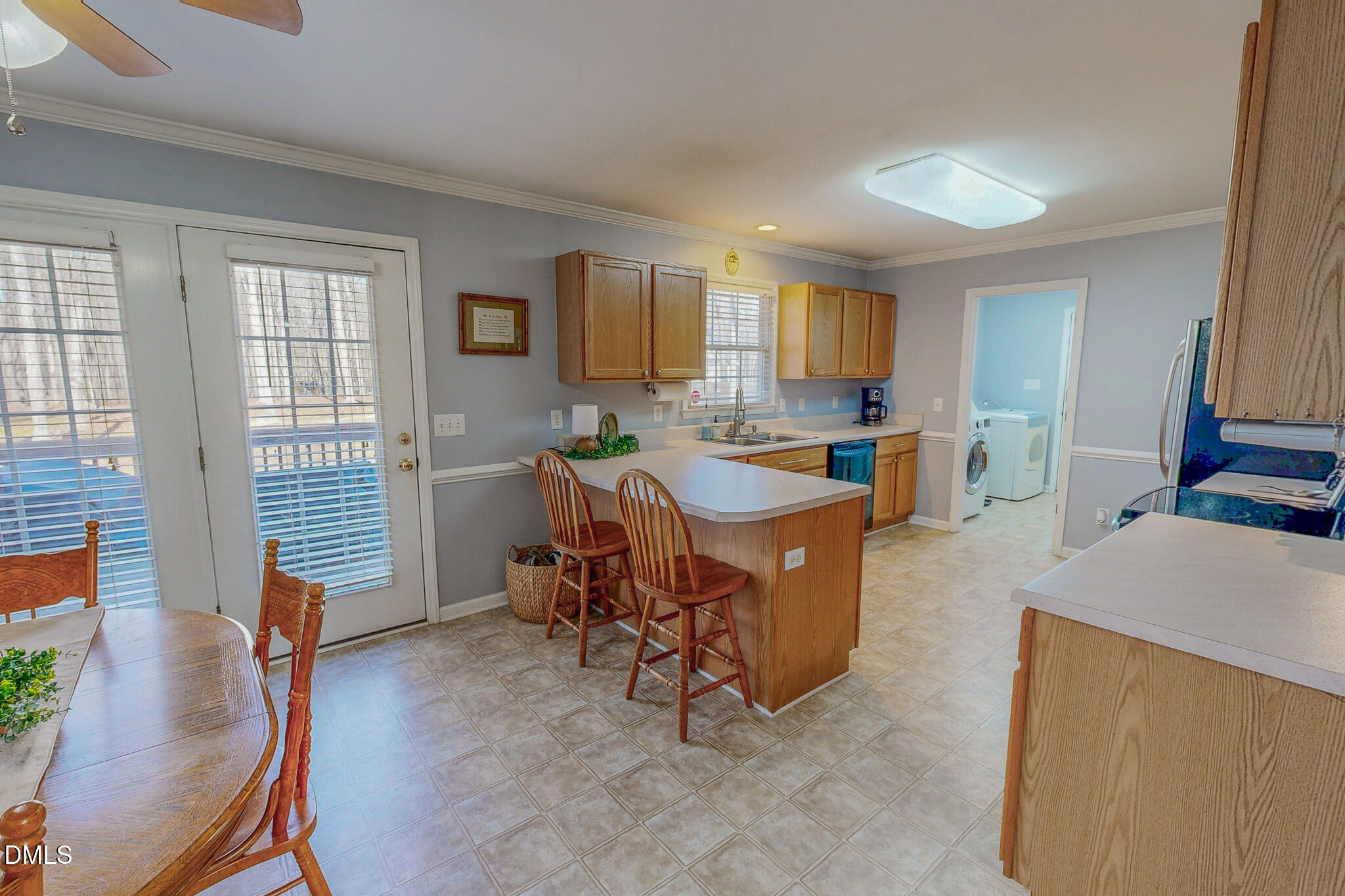 60 Forest Drive Timberlake, NC 27583 - Photo 3 of 40 a living room with furniture a flat screen tv and a table