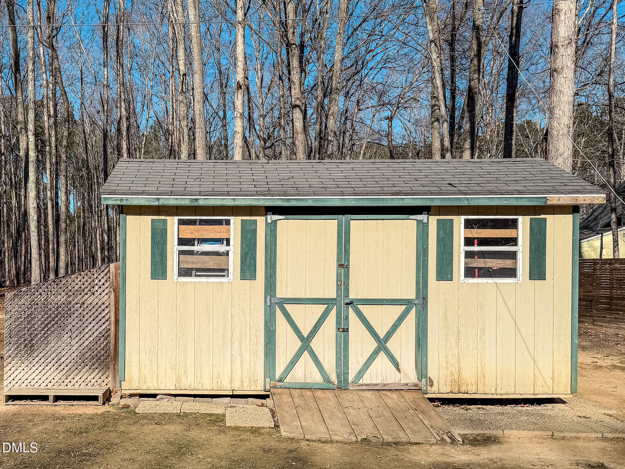 60 Forest Drive Timberlake, NC 27583 - Photo 33 of 40 a view of a house with a wooden fence