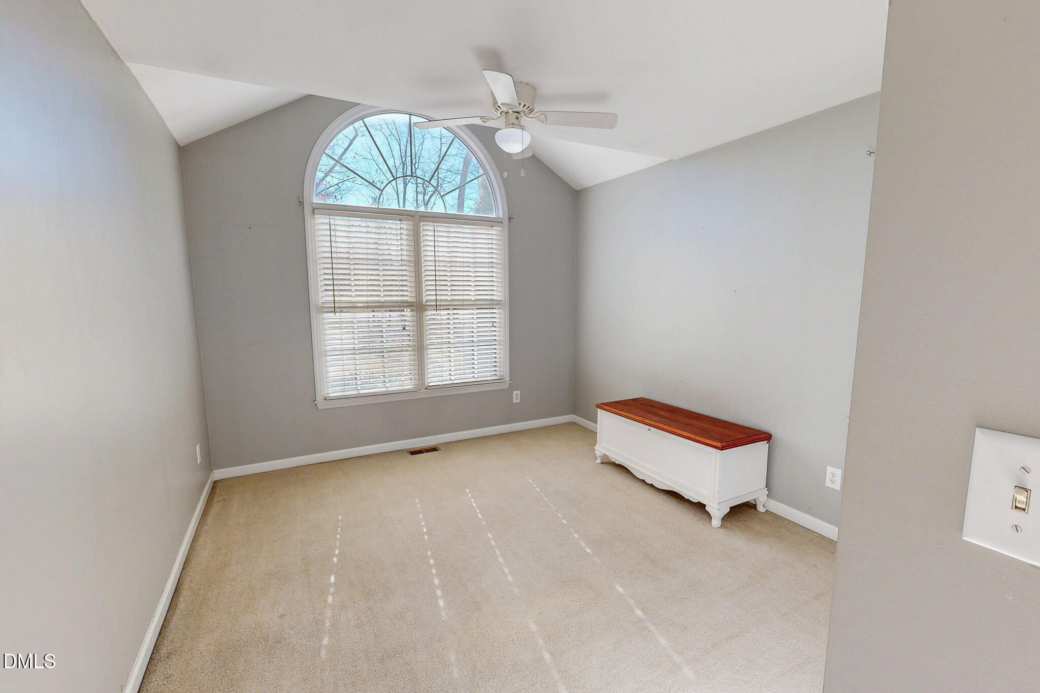 60 Forest Drive Timberlake, NC 27583 - Photo 35 of 40 an empty room with windows and ceiling fan