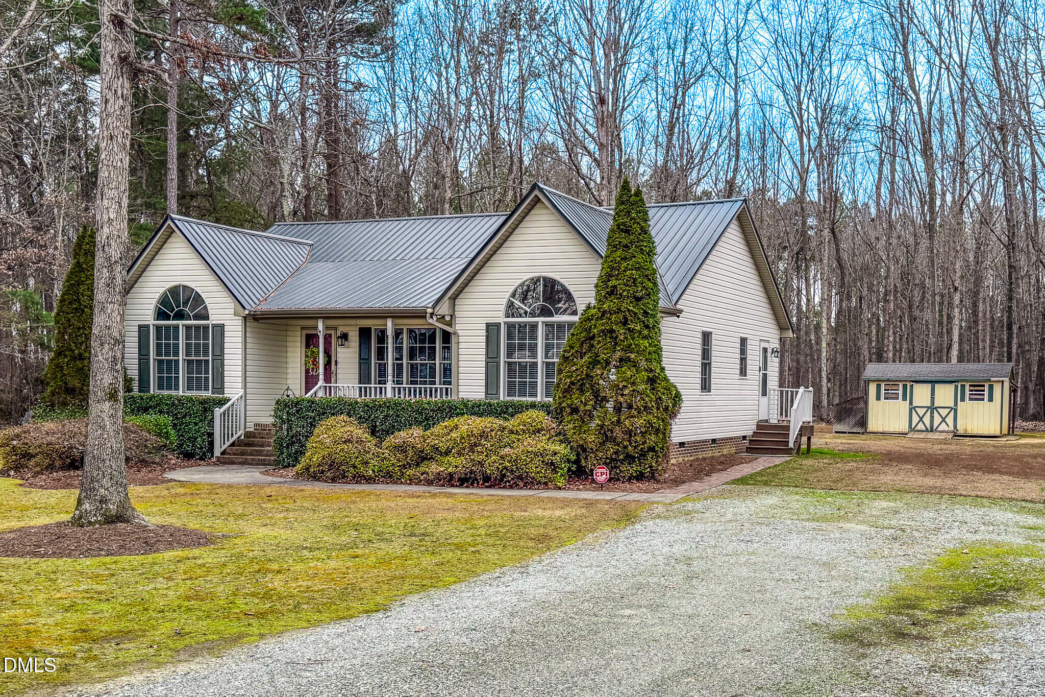 60 Forest Drive Timberlake, NC 27583 - Photo 5 of 40 a front view of a house with a yard