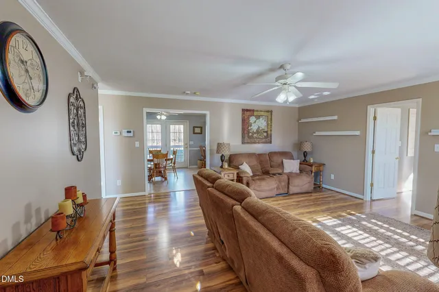 a living room with furniture and a table