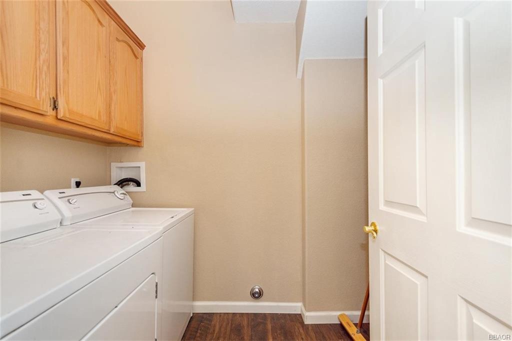 613 Riverside Avenue Sugarloaf, CA 92386 - Photo 19 of 27 a utility room with dryer and washer