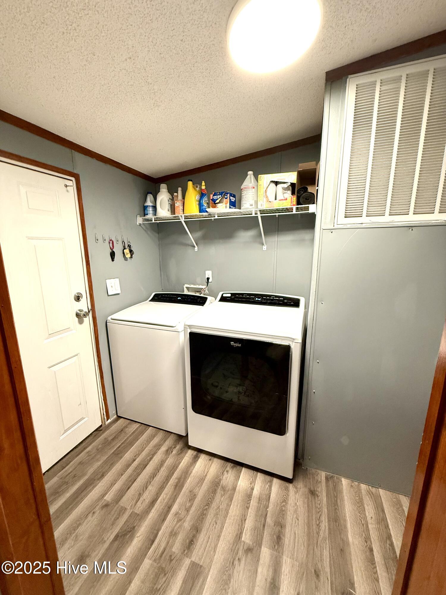 3682 Titan Roberts Road Erwin, NC 28339 - Photo 16 of 51 Laundry room - washer and dryer conveys with property.