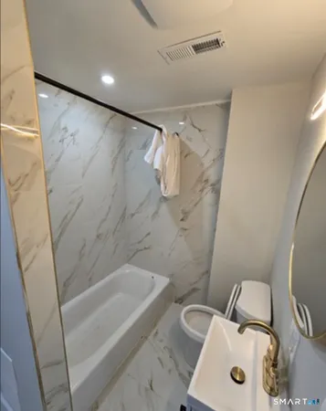 a bathroom with a sink and a tub