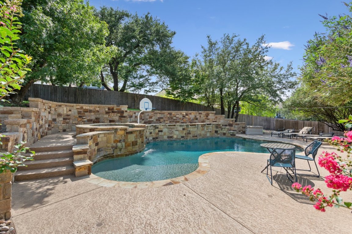 320 Ridge View Drive Georgetown, TX 78628 - Photo 20 of 31 a view of a swimming pool with a patio