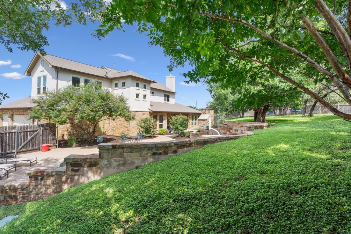 320 Ridge View Drive Georgetown, TX 78628 - Photo 22 of 31 a view of house with a yard and sitting area