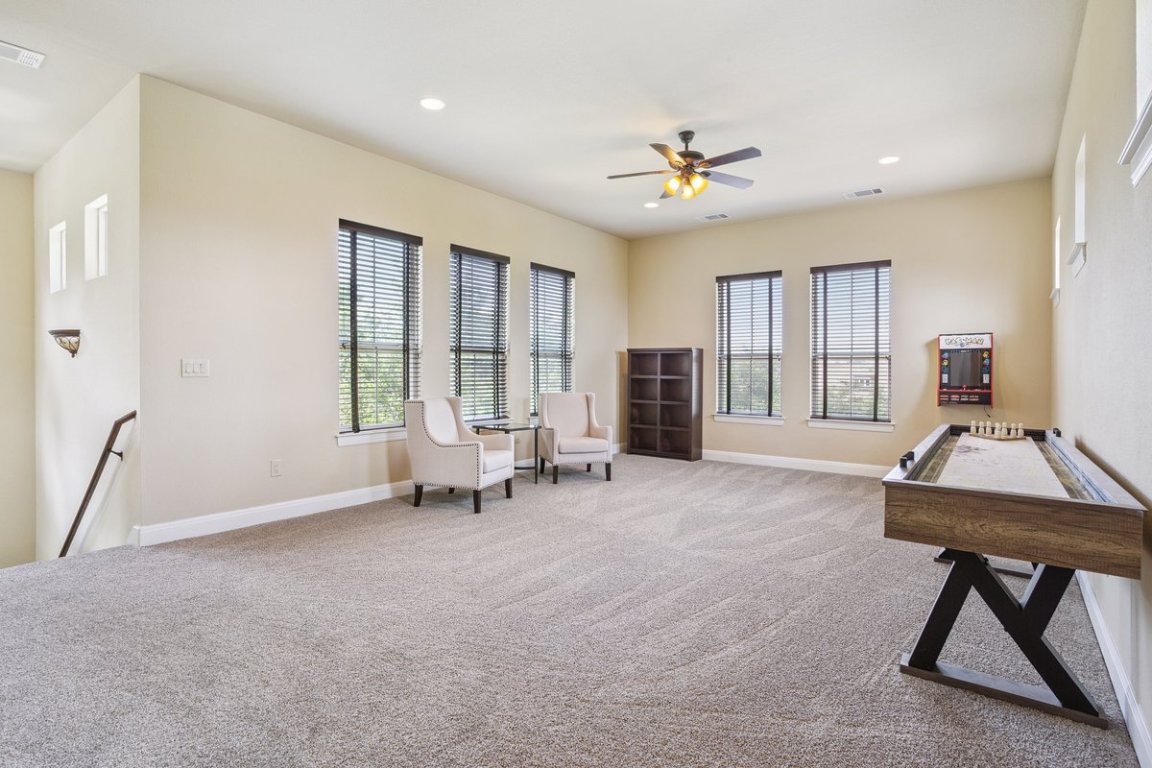 320 Ridge View Drive Georgetown, TX 78628 - Photo 8 of 31 a living room with furniture and a large window