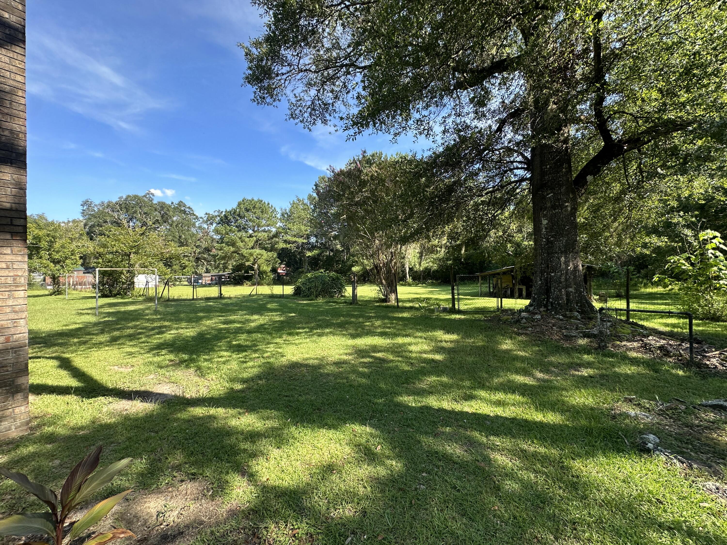 1875 Hathaway Johnson Road Baker, FL 32531 - Photo 21 of 40 a view of a green field