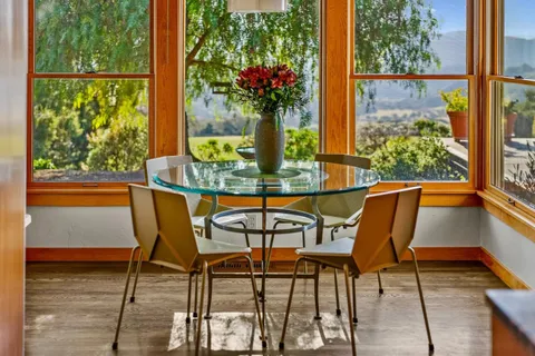 a kitchen with stainless steel appliances granite countertop a stove and a sink