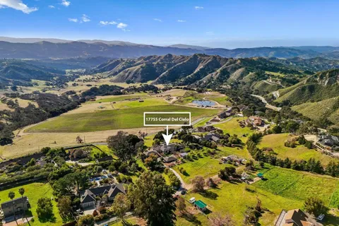 a view of an ocean and mountain