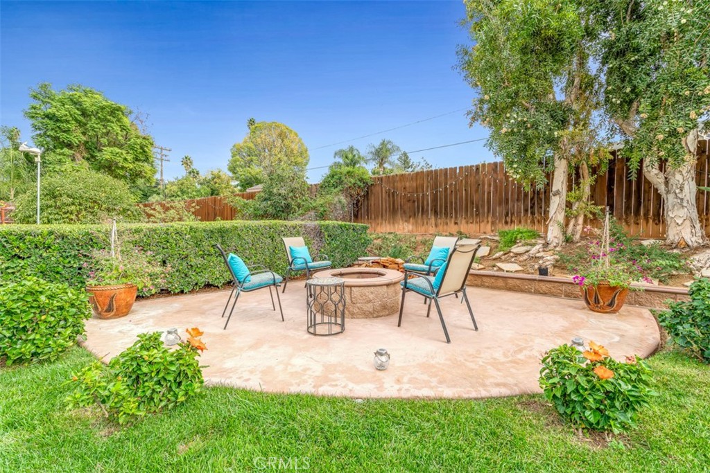 5056 Windhill Drive Riverside, CA 92507 - Photo 12 of 66 a view of a backyard with sitting area