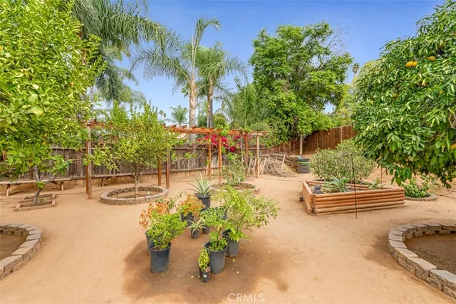 an aerial view of residential houses and outdoor space