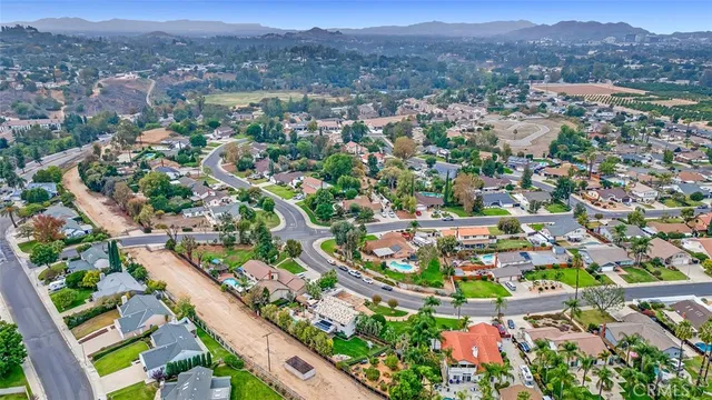 a living room with furniture and a lamp