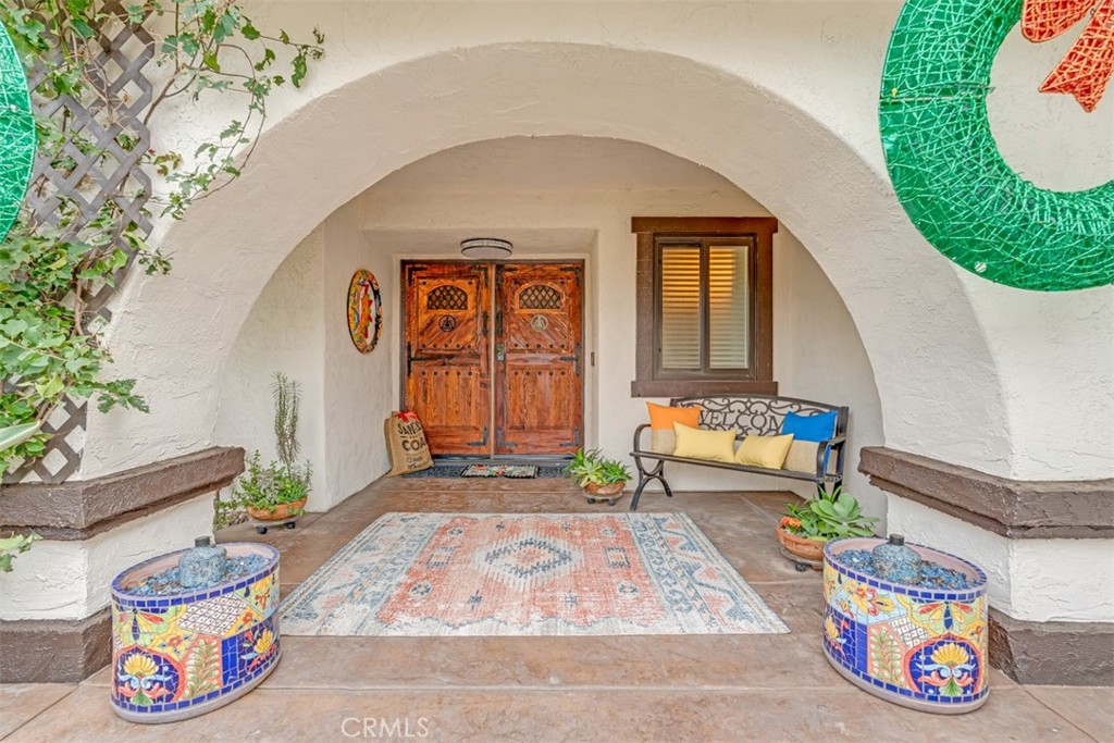 5056 Windhill Drive Riverside, CA 92507 - Photo 28 of 66 a front view of a house with blue lights