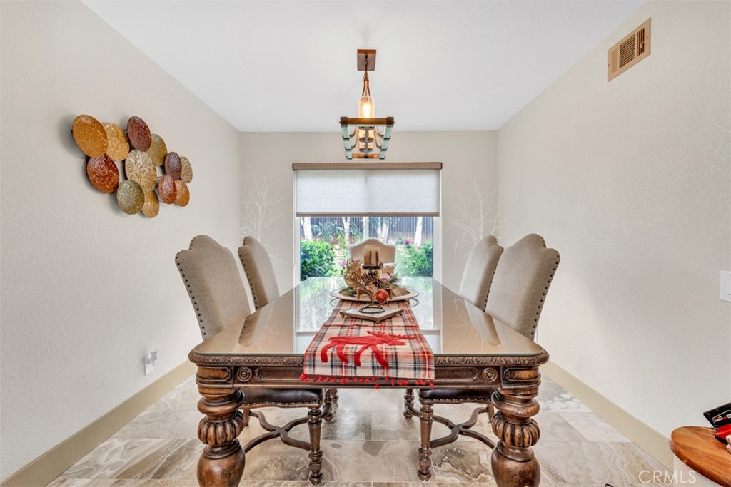 5056 Windhill Drive Riverside, CA 92507 - Photo 34 of 66 a view of a workspace with furniture and wooden floor