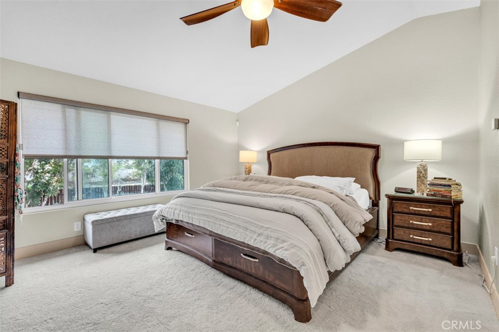 5056 Windhill Drive Riverside, CA 92507 - Photo 58 of 66 a spacious bedroom with a bed and a large window