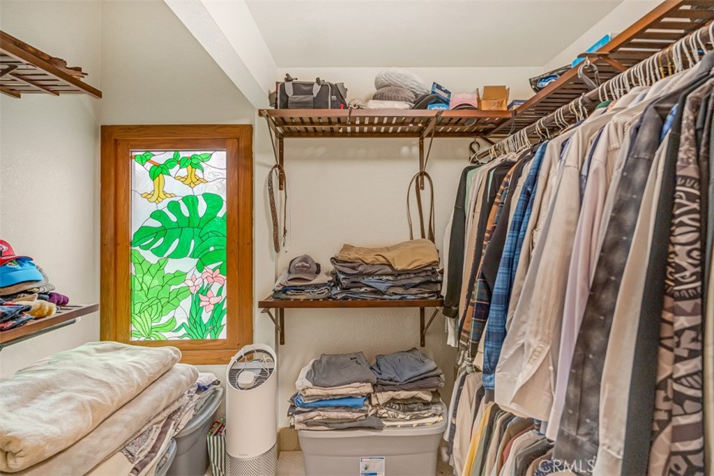 5056 Windhill Drive Riverside, CA 92507 - Photo 63 of 66 a view of a balcony with furniture and a potted plant