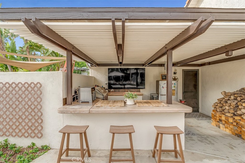 5056 Windhill Drive Riverside, CA 92507 - Photo 64 of 66 a dining table with chairs and window