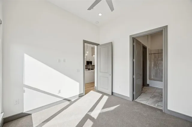 a view of a room with a hallway