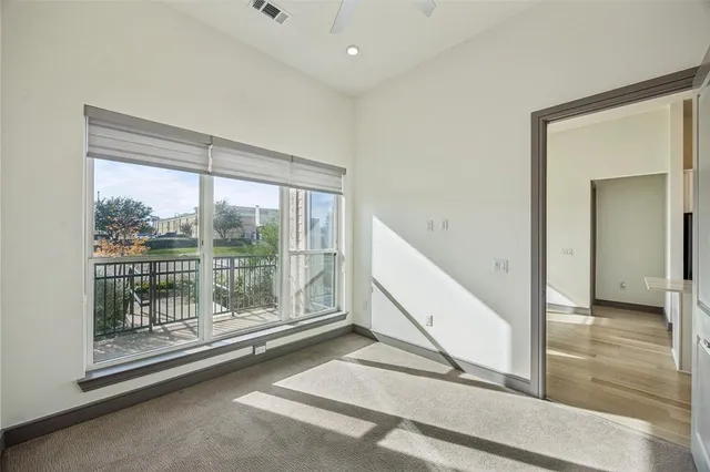 a view of a room with a large window