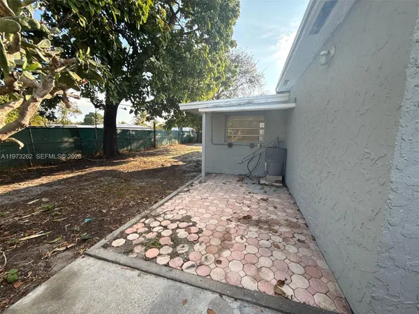 a view of a yard with an outdoor space